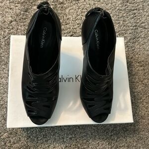 Sexy black peep toe bootie